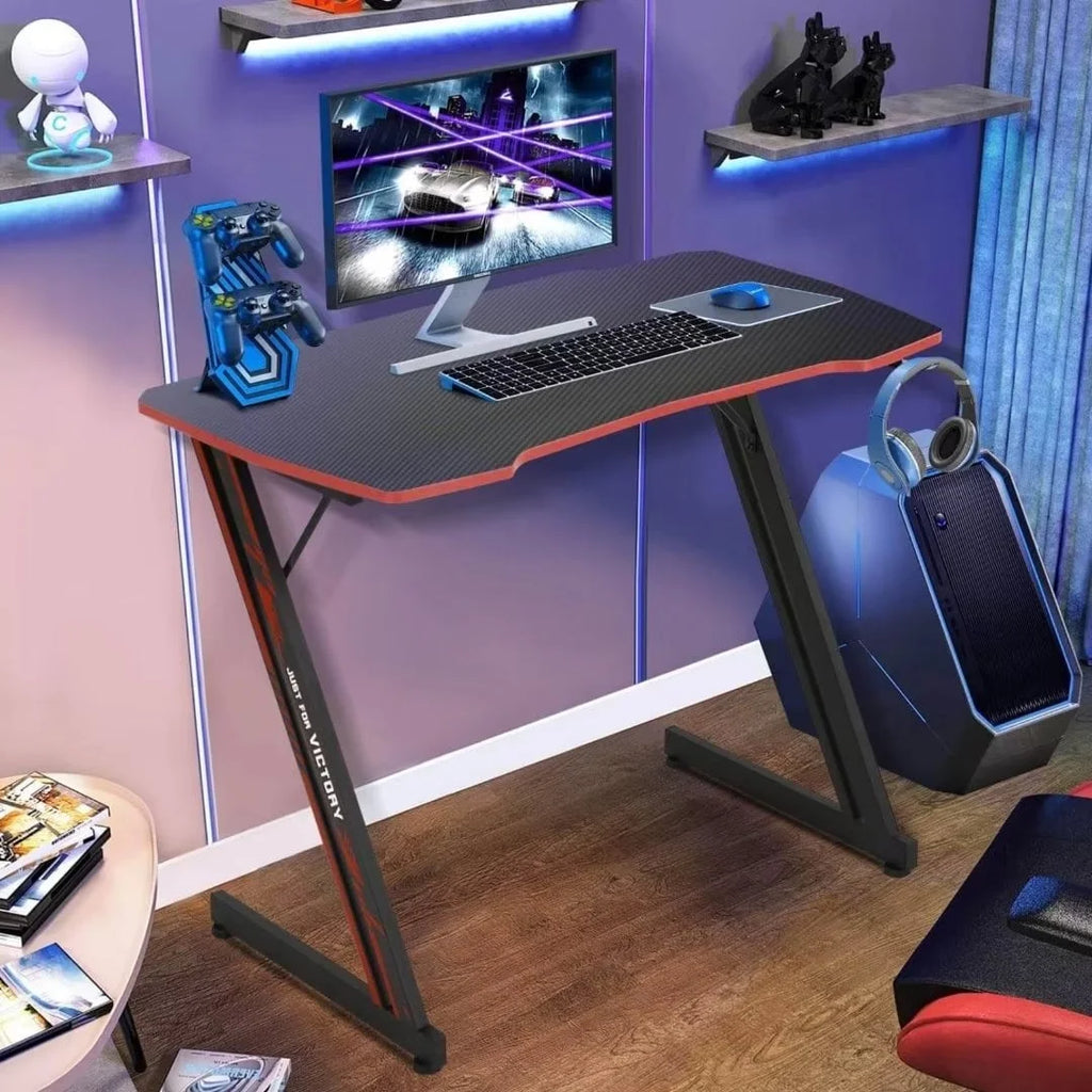 Level up your gaming setup with this sleek 39.4" Z-Shaped Desk! Perfect for your home office or gaming den, featuring an ergonomic design and handy headphone hook. 🚀🎮 #GamingDesk #GamerLife