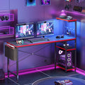Level Up Your Gaming Setup: 61" Reversible Desk with LED Lights & PC Shelf!